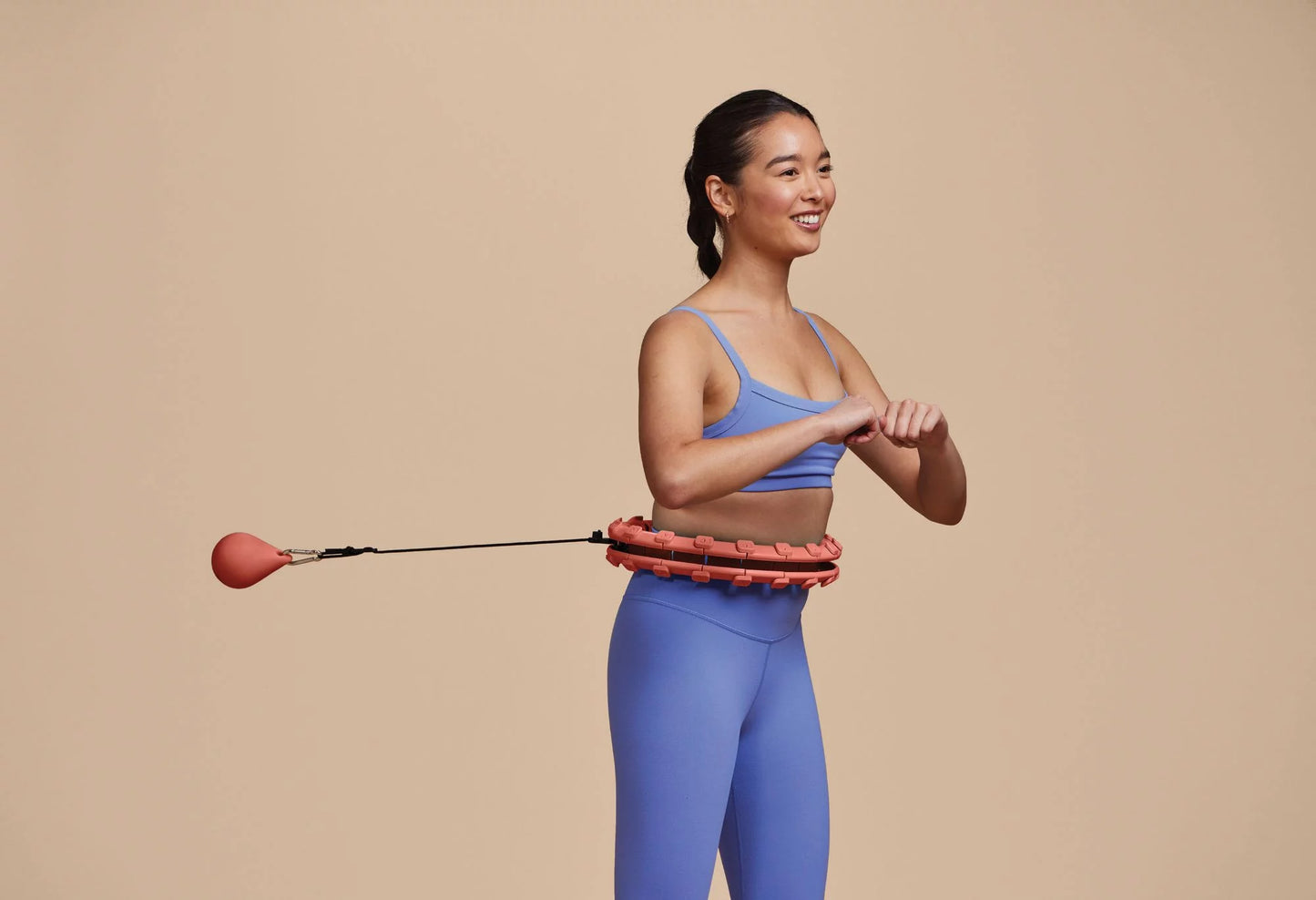 Adjustable Coral Weighted Fitness Hoop with Weight Attachment for Enhanced Workouts
